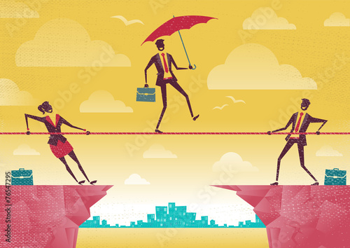 Businessman and Businesswoman use Teamwork on Clifftop.
