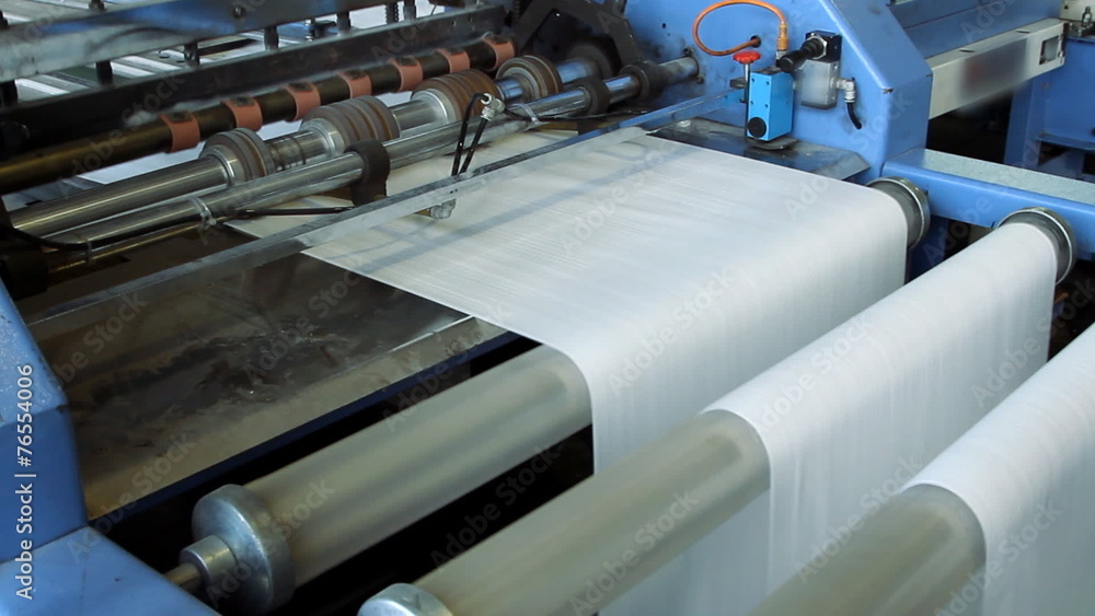 Big polymeric tape roll unreel for a printing press Big polymeric tape roll unreel for a printing press