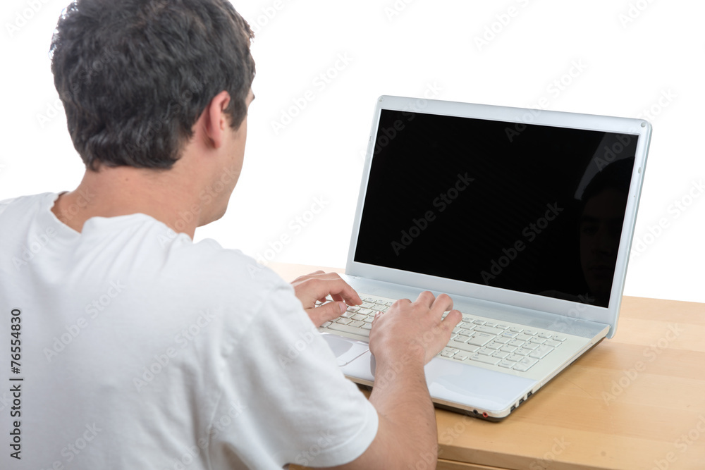 young man working with his laptop young man working with his laptop
