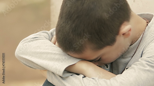 Wallpaper Mural Close-up portrait of upset little boy Torontodigital.ca