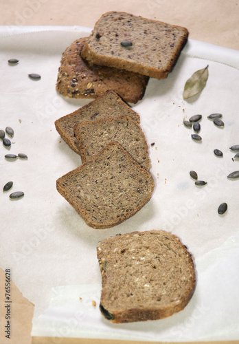 Different kinds of bred with pumpkin seeds and bay leaf