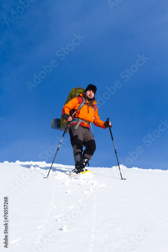Hiker in winter mountains © vetal1983