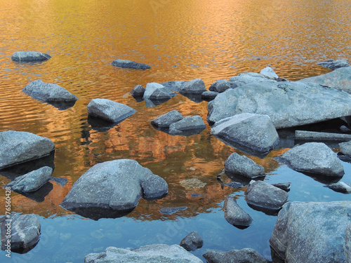Golden Reflection On A Mountain Lake