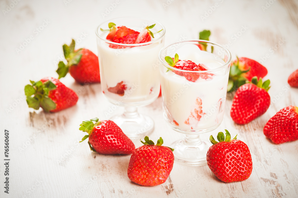 Fluffy and full of vitamins healthy strawberries on white wooden Fluffy and full of vitamins healthy strawberries on white wooden