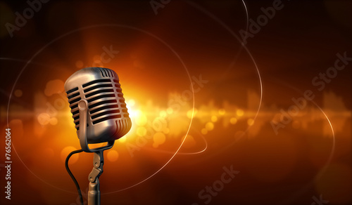 Retro microphone and abstract background with sound waves