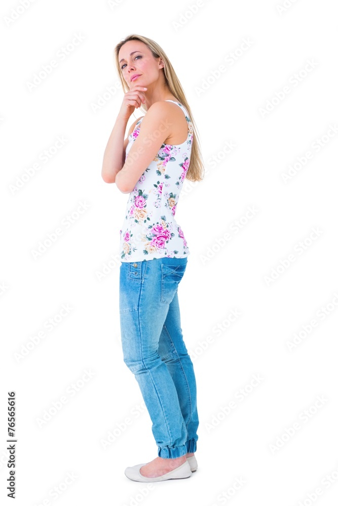 Pretty blonde thinking with hand on chin Pretty blonde thinking with hand on chin