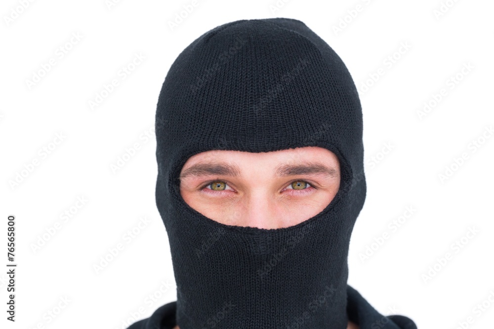 Portrait of man in balaclava looking at camera Portrait of man in balaclava looking at camera