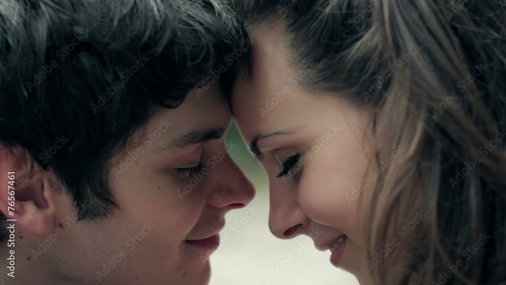 fall in love,lovers smiling, caressing and rubbing noses together fall in love,lovers smiling, caressing and rubbing noses together