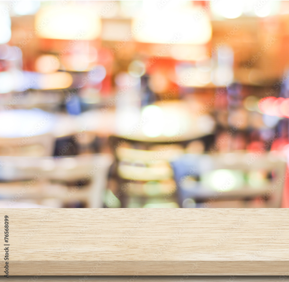 Empty wood table and blurred cafe with bokeh light background Empty wood table and blurred cafe with bokeh light background