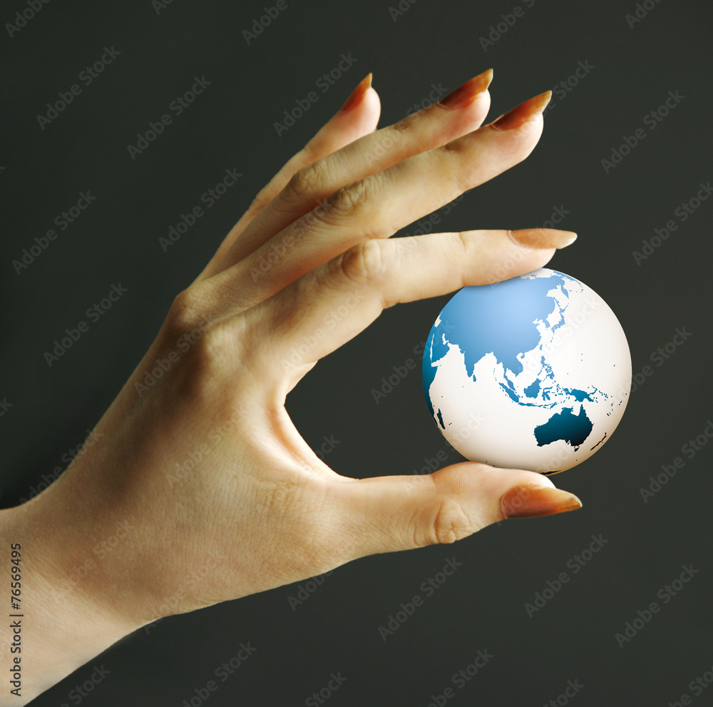 地球と女性の手 バック黒 Stock Photo Adobe Stock