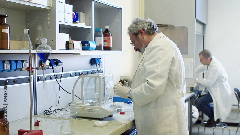 biochemists in a laboratory biochemists in a laboratory