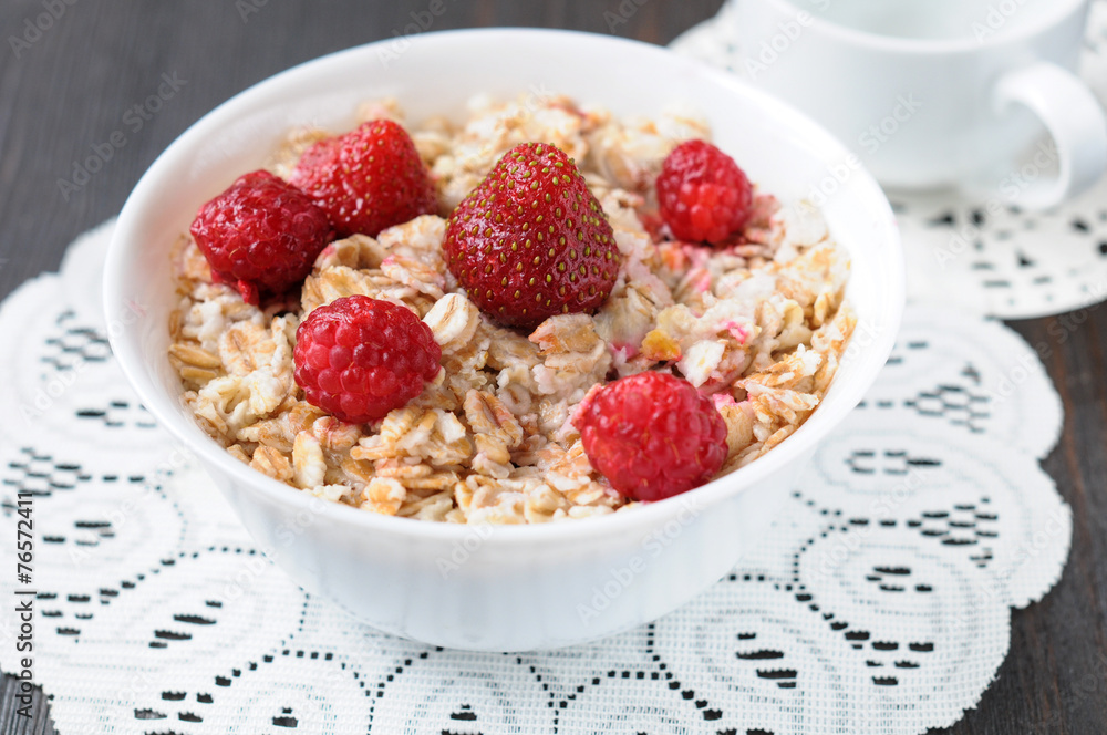 Cereal with strawberries and raspberries for breakfast Cereal with strawberries and raspberries for breakfast