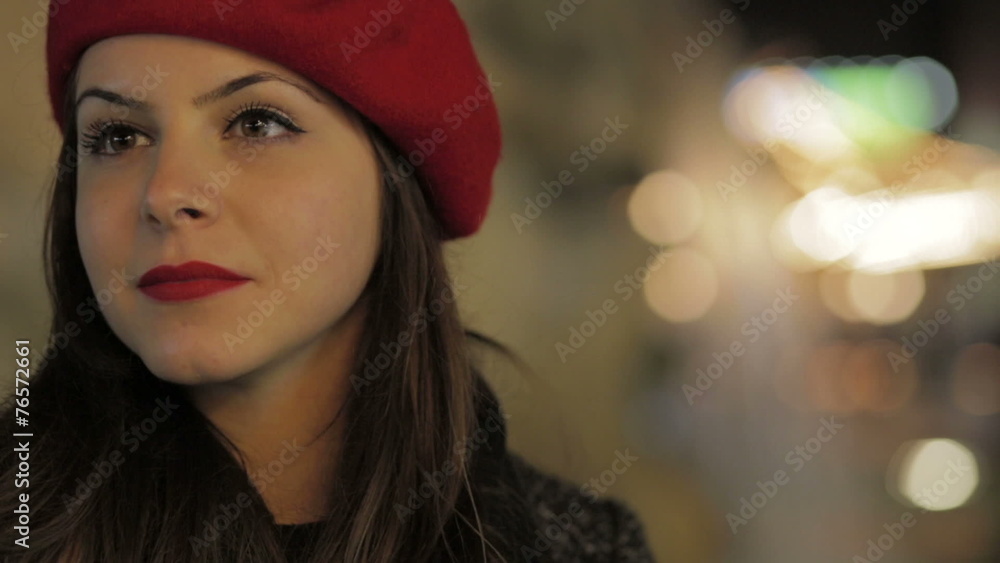 beautiful young woman is waiting for her boyfriend, and looks around to see it beautiful young woman is waiting for her boyfriend, and looks around to see it