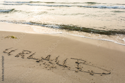 Schriftzug am Strand