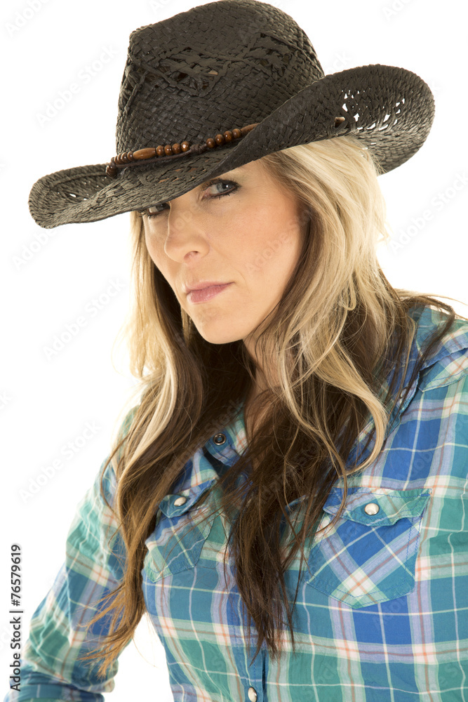 cowgirl blue shirt close black hat looking cowgirl blue shirt close black hat looking