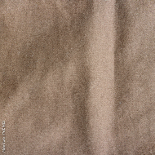 Brown fabric texture with delicate striped pattern.