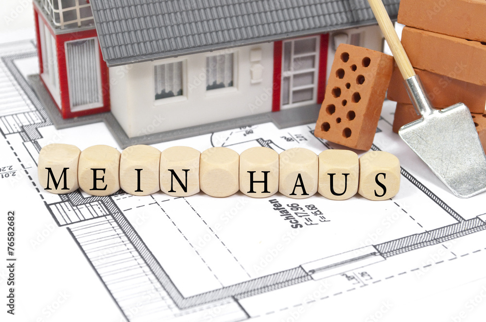 Bauplan mit Ziegelstein und Haus mit Mein Haus Stock Photo | Adobe Stock