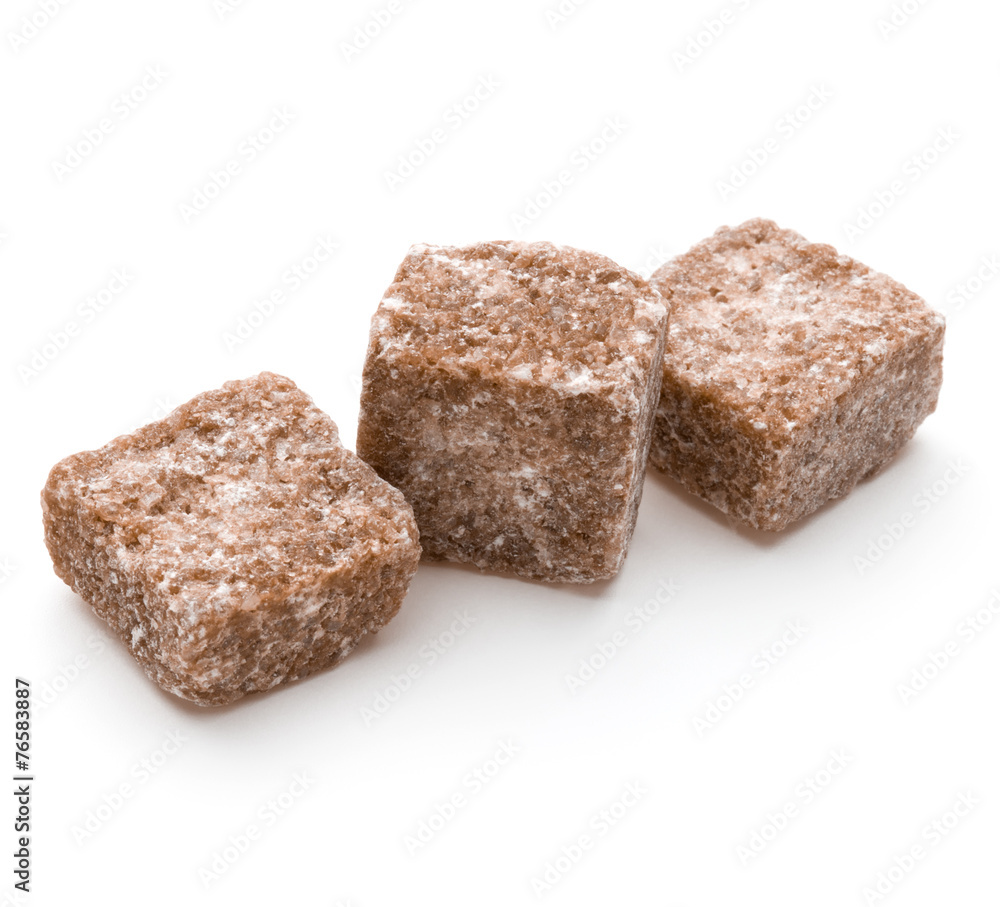 Brown lump cane sugar cube isolated on white background cutout Brown lump cane sugar cube isolated on white background cutout