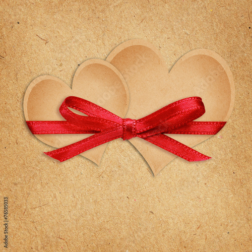 Craft paper hearts tied wit...