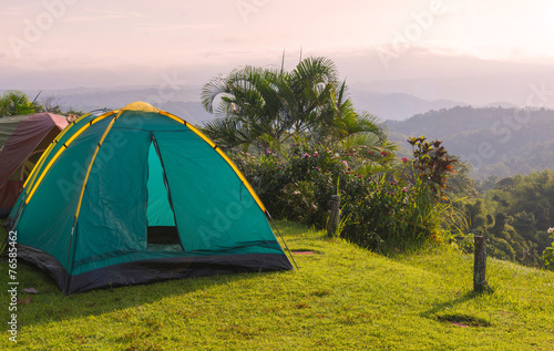 Camping tent in campground at national park with sunrise