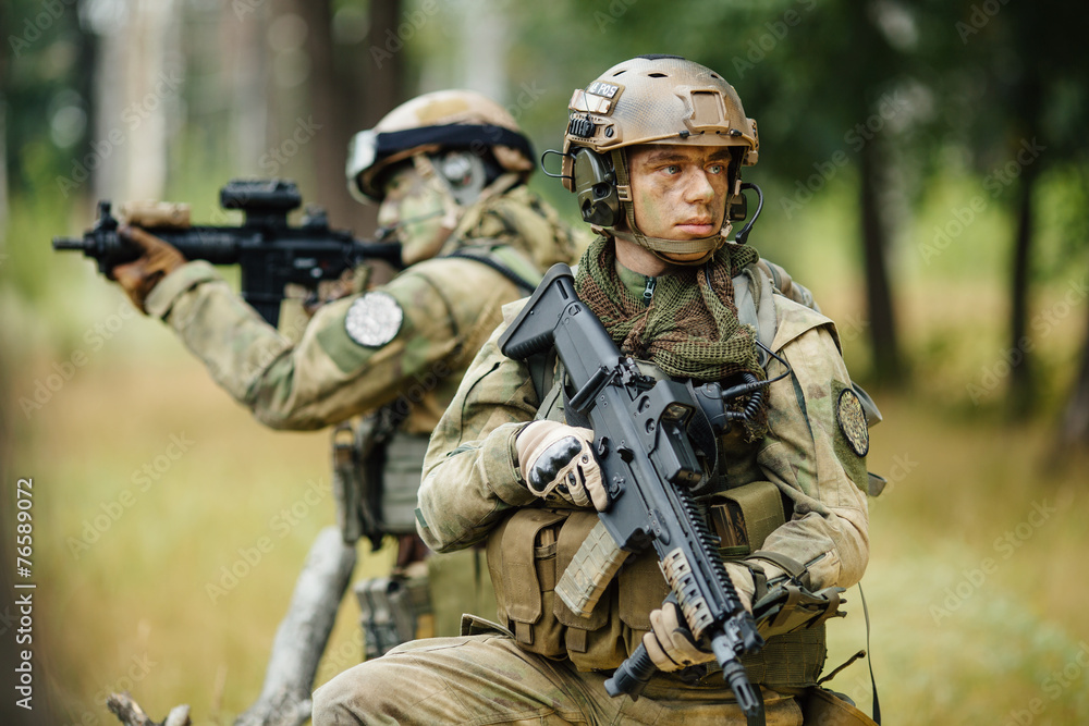 team of soldiers are reconnaissance team of soldiers are reconnaissance