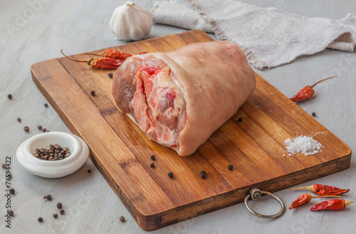 Fotografie Piece of pork shank on a cutting board