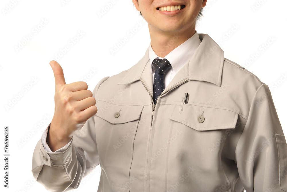 作業服を着ている笑顔の男性