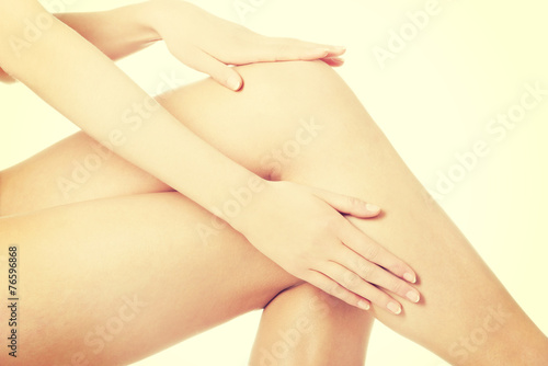 Woman s smooth knee  pampering.