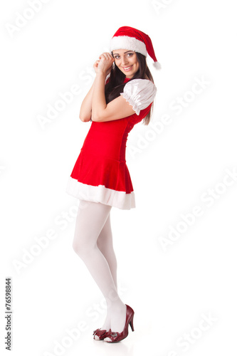 Young woman in Santa costume. Christmas.