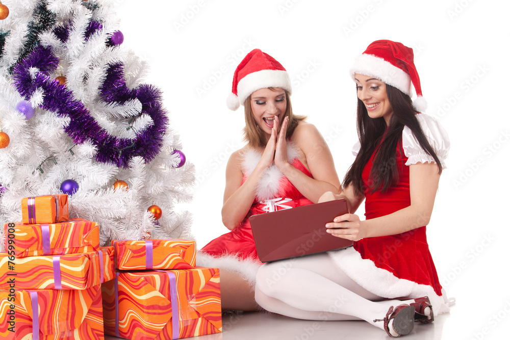 Christmas girlfriends with laptop. Christmas girlfriends with laptop.