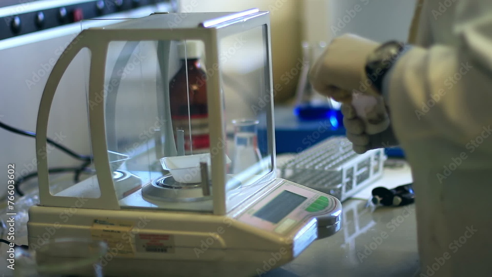 biochemist weighing chemical compound biochemist weighing chemical compound
