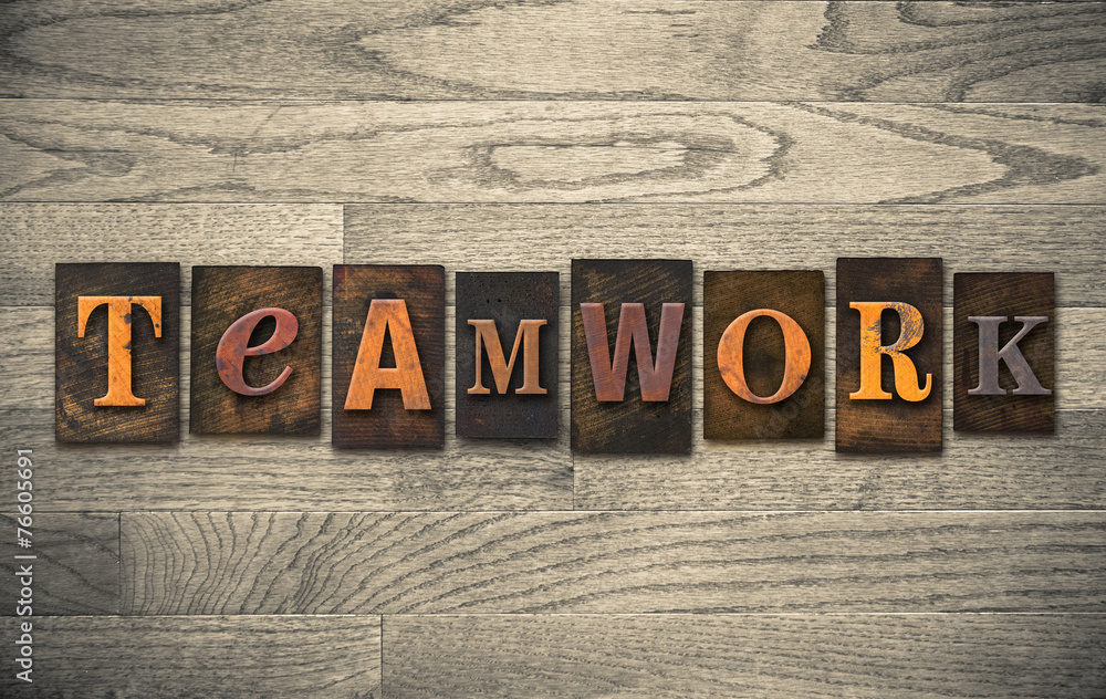 Naklejka premium Teamwork Wooden Letterpress Concept