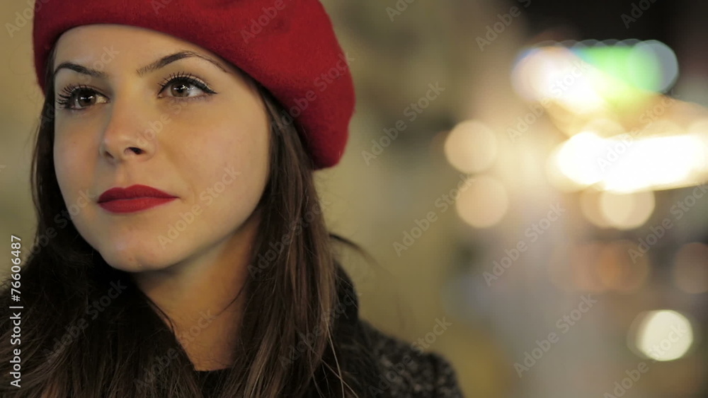beautiful young woman waiting for someone and looks around to see it beautiful young woman waiting for someone and looks around to see it