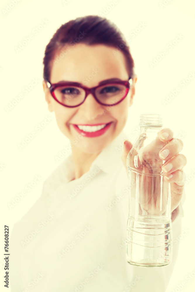 Business woman with plastic bottle of water. Business woman with plastic bottle of water.