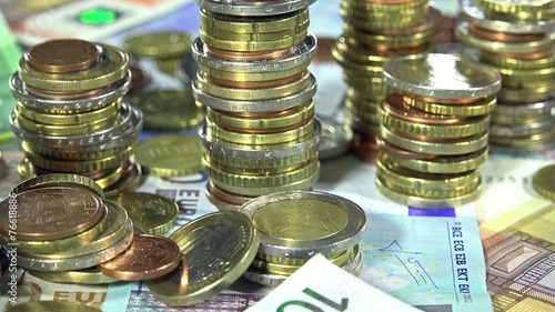 Euro Banknotes and Coins (dolly shot)