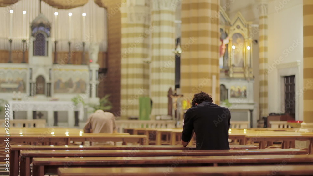 People pray in a church People pray in a church