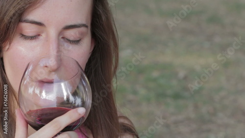 young sommelier woman tasting a burgundy,bordeaux photo