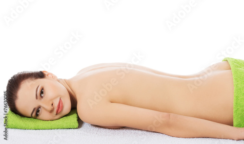 Girl on a stone therapy, hot stone massage