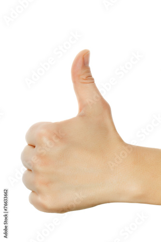 Closeup of male hand showing thumbs up sign against white backgr