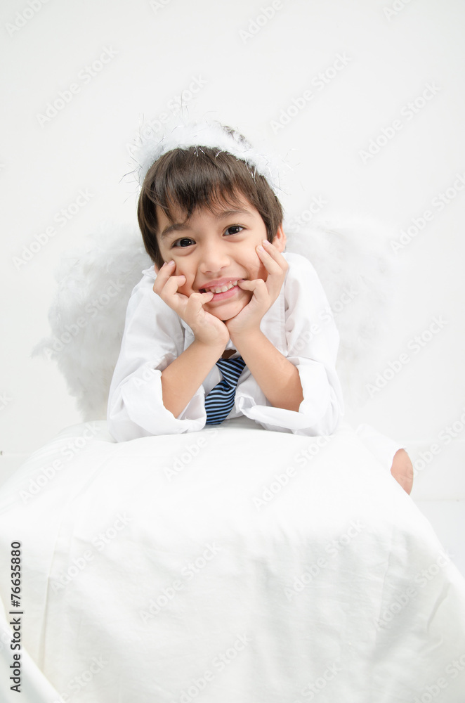 Little boy portrait pretend as cupid with wing Little boy portrait pretend as cupid with wing