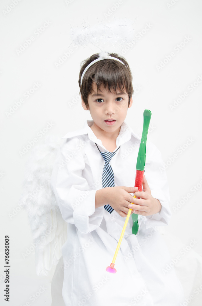 Little boy portrait pretend as cupid with wing