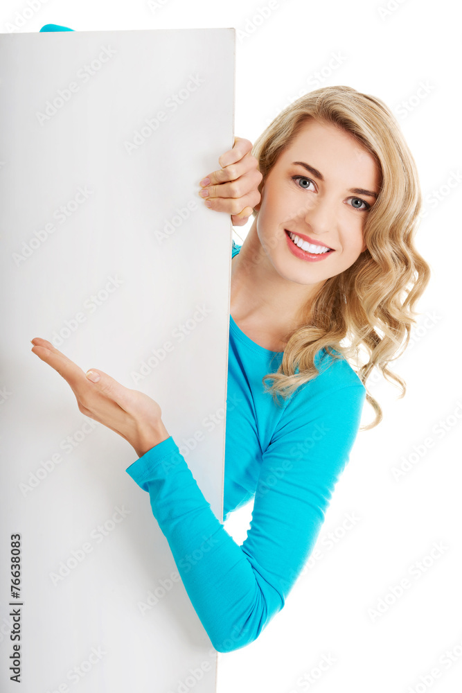 Portrait of happy woman with blank board Portrait of happy woman with blank board