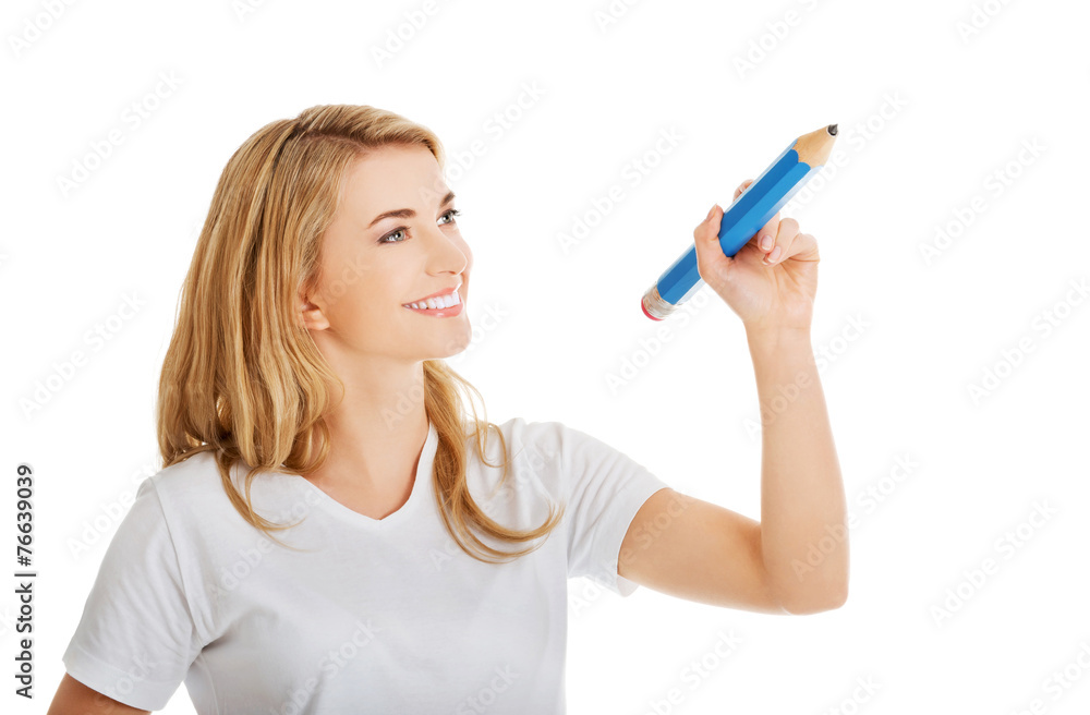 Woman writing with pencil Woman writing with pencil