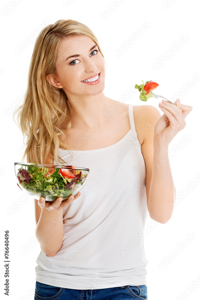 Smiling woman eating salat