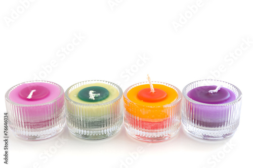 Colorful candles isolated on white background