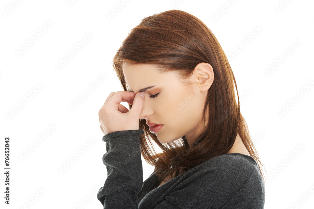 Woman with sinus pressure pain