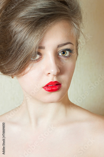 portrait of young beautiful woman with red lipstick