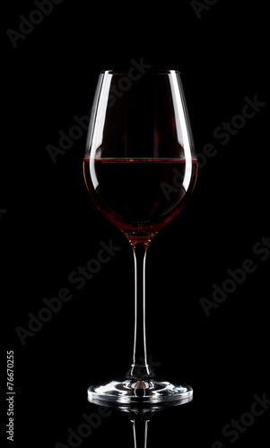 Transparent glass of red wine