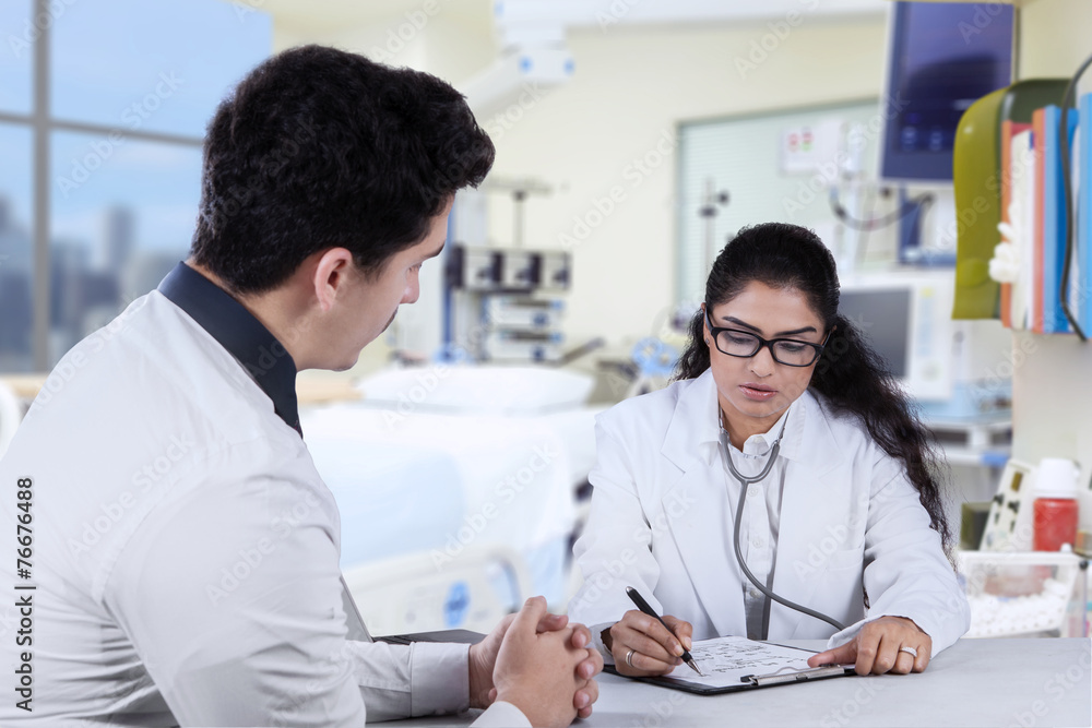 Practitioner write prescription for male patient Practitioner write prescription for male patient