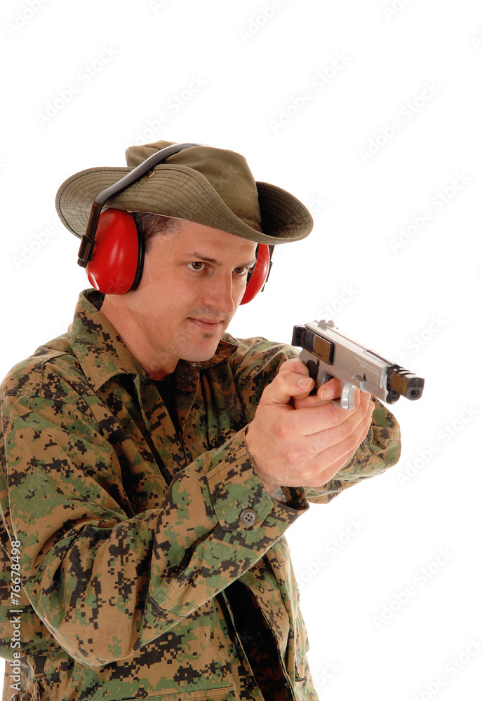 Soldier pointing a pistol.